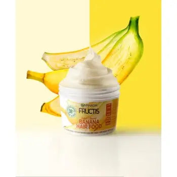 GARNIER<br> <b> FRUCTIS BANANA HAIR FOOD</b><br><h5>masque nourrissant pour cheveux secs-390ml</h5>Origine France <img style="vertical-align: middle;" src=" https://shorturl.at/bDMR9">