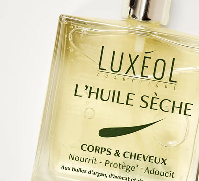 LUXEOL<br> <b> L'huile sèche corps & cheveux</b><br><h5> Nourrit - Protège - Adoucit-100ml</h5>Origine France <img style="vertical-align: middle;" src=" https://shorturl.at/bDMR9">