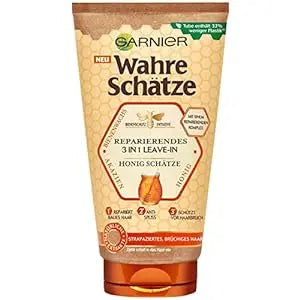 GARNIER<br> <b>WAHRE SCHATZE</b><br>REPARIERENDES 3 IN 1 LEAVE-IN<br><h5>cheveux rugus-150ml</h5>Origine Turquie <img style="vertical-align: middle;" src=" https://shorturl.at/cyMX1">